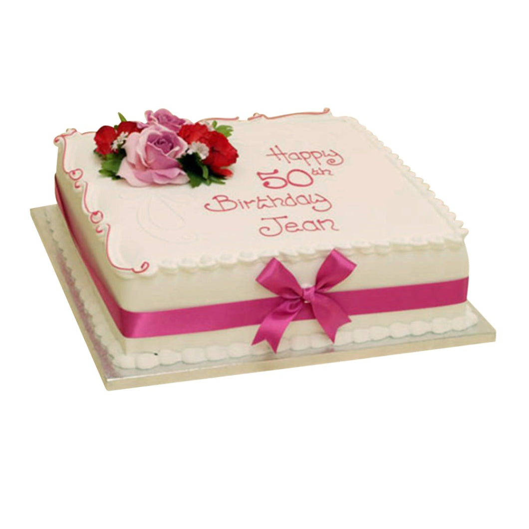 Cake decorated with silk flowers